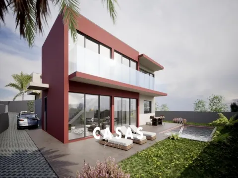 Lote de terreno com 870m2 e com projeto aprovado para construção de duas moradias na Ponta Do Pargo